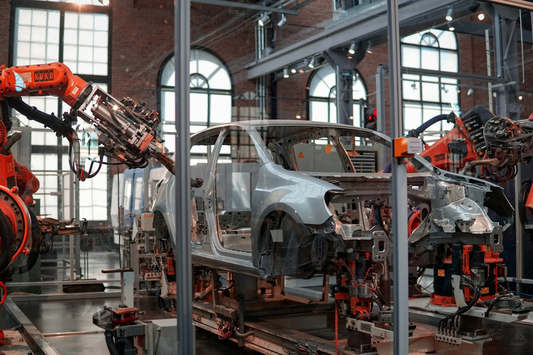 Industrial robot working inside an automated production cell